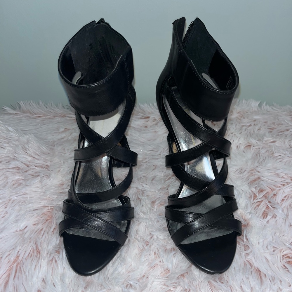 Sexy, black heels! Zipper back, 4 inch heel.  Worn 3 times in GREAT condition.